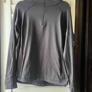 Athleta 1/4 Zip with zippered pockets and thumb holes